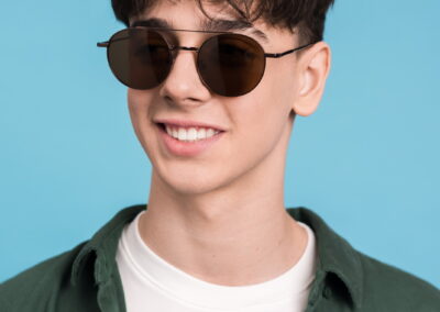 Portrait of a smiling young man in sunglasses